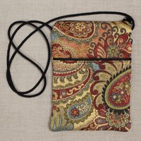 Red, gold, black, and aqua paisley crossbody bag